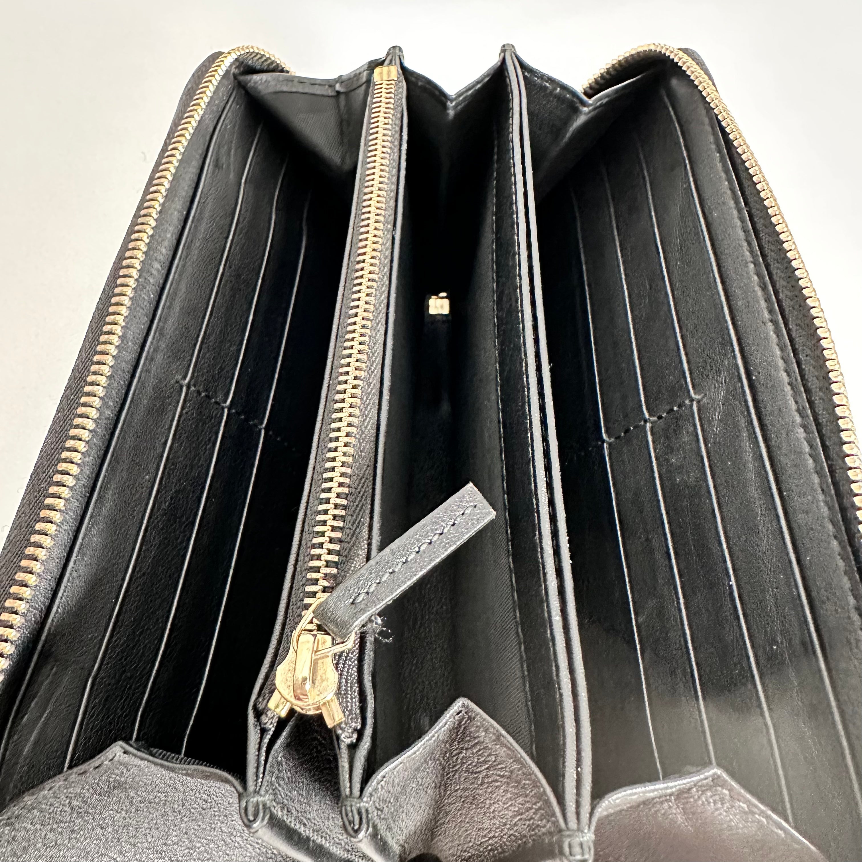 Black Guccissima Zippy Wallet